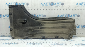 Front right underbody protection for BMW X7 G07 19-22 is dented and has tears