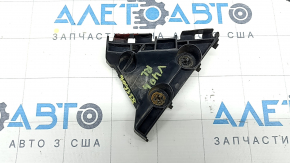 The rear bumper mount, triangle, left, Toyota Camry v40, is broken.