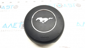 Black steering wheel airbag for the driver's side of a Ford Mustang mk6 18-23, rusty squib