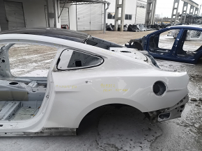 Rear left quarter wing for a Ford Mustang mk6 15-23 coupe, on the body, white, with bumps. Painted 0.25-0.3