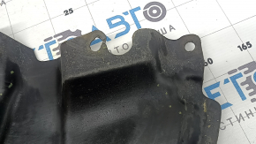 The lower right engine guard for a Toyota Camry v40 07-09 is torn and dented.