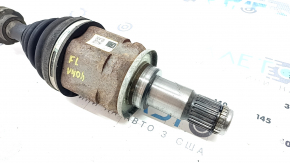 The front left drive axle shaft of a Toyota Camry V40 hybrid is rusty and the threads are dented.
