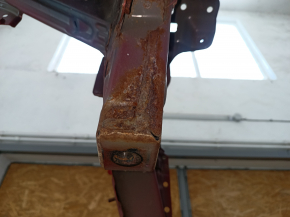 Front left quarter panel of Toyota Camry v40 on the body, red, rusty, painted