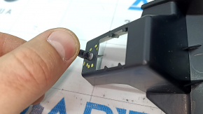 The lower left rear pillar trim for the Audi Q8 19-26 is black and the guide is broken.