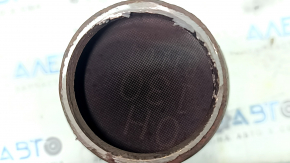 The rear catalytic converter of a Toyota Camry V40 hybrid has been cut off, without the downpipe.