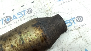 The rear catalytic converter of a Toyota Camry V40 hybrid has been cut off, without the downpipe.
