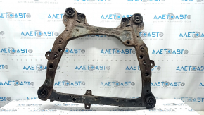 The front subframe of a Toyota Camry V40 hybrid is rusty and the silent block is torn.