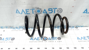 The front left spring of a Toyota Camry v40 is rusty.