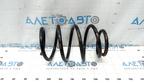 The front right spring of a Toyota Camry v40 is rusty.