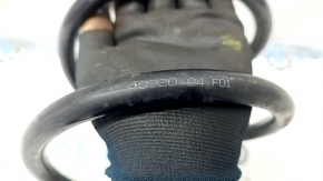 The front left spring of a Toyota Camry v40 is rusty.
