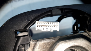 Honda CRV 23-26 black leather steering wheel with orange stitching under the paddles and pads
