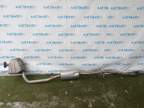 The exhaust pipe, the middle part with the barrel of the Honda CRV 23-26 HEV AWD, is crushed.
