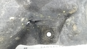 The front left underbody protection of the Audi Q8 19-26 is torn.