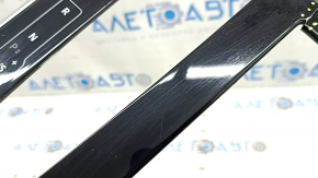 Upper center console trim for Audi Q8 19-26, glossy black with chrome, backlit, scratches
