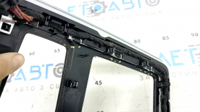 Upper center console trim for Audi Q8 19-26, glossy black with chrome, backlit, scratches