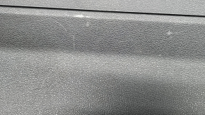 The lower trim of the Audi Q8 19-26 black trunk door without a curtain on the glass, scratches