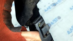 The front bumper grille, left, BMW X5 G05 19-23, under the parking sensors and fog lights, X-Line, is cracked.