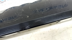 The Audi Q8 19-26 trunk lid trim has bulged.