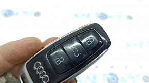 Audi Q8 19-26 key, 4 buttons, glossy black, worn, nicks, scratches