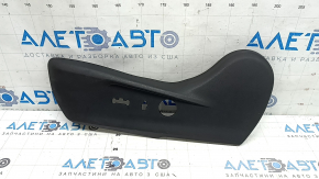 Subaru Forester 19-24 SK driver's seat control cover is black, with cracks in the fasteners.