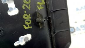 Subaru Forester 19-24 SK driver's seat control cover is black, with cracks in the fasteners.