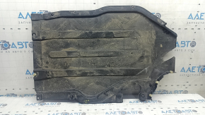 The rear left underbody protection of the BMW X5 G05 19-26 is dented.