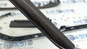 Left lower front panel trim for Audi Q8 19-26, gray-brown wood, with backlight, scratched
