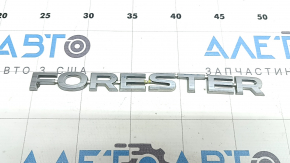 The FORESTER emblem on the Subaru Forester 19-24 SK is broken off.
