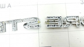 The FORESTER emblem on the Subaru Forester 19-24 SK is broken off.