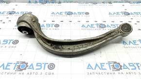 The lower control arm, front left rear, Audi Q8 19-26, has a torn silent block and boot.