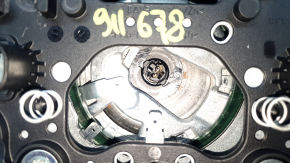 The driver's side airbag in the steering wheel of a VW Tiguan 22-24 is black and the plastic has turned white.