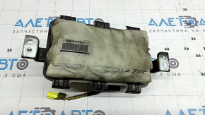 The passenger airbag in the dashboard of a Subaru Forester 19-24 SK is covered in soot and has a rusty squib.