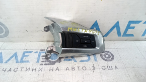 Upper right steering wheel control buttons on a Ford Mustang mk6 15-23 with scratches