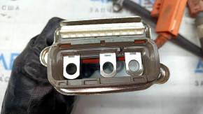 The high-voltage battery cable for a 13-15 Toyota Avalon is broken.