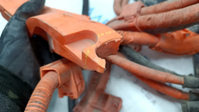 The high-voltage battery cable for a 13-15 Toyota Avalon is broken.