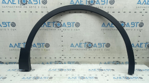 Front right fender arch trim for VW Tiguan 22-24. Structure. Scratches, dented fastener.