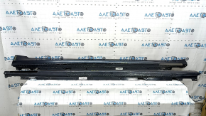 A set of illuminated door sills for a BMW 7 G12 16-22, M-Sport, worn, scratched, after repair