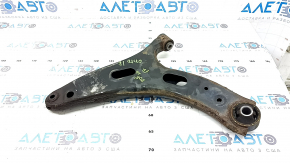 The lower front right control arm of a Subaru Forester 19-24 SK is rusty, with microcracks.