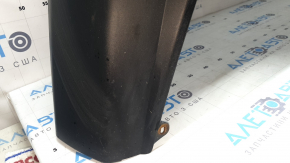 The bare lower part of the rear bumper of a Toyota Rav4 19-24 without parking sensors. The structure, scratches, sand, and whitened plastic are visible.