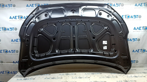 The bare hood of the Hyundai Elantra AD 19-20 steel, creased