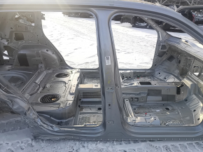 The central right body pillar of a VW Tiguan 18-24 is dented on the body.