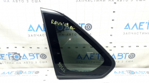 Rear left Toyota Rav4 19-24 window, tinted, with chrome molding, torn seal