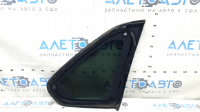 Rear left Toyota Rav4 19-24 window, tinted, with chrome molding, torn seal