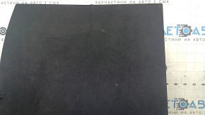 The central trunk floor of a Toyota Rav4 19-24 is black and needs cleaning.