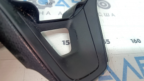 The steering wheel controls on a Toyota Rav4 19-23 without a heated steering wheel, black trim, and scuff marks.
