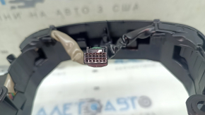 The steering wheel controls on a Toyota Rav4 19-23 without a heated steering wheel, black trim, and scuff marks.