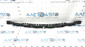 The rear bumper central mount for a Ford Fusion mk5 19-20 is broken and bent.