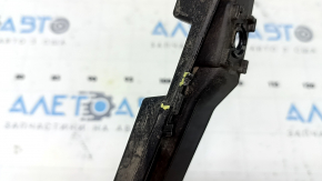 The rear bumper central mount for a Ford Fusion mk5 19-20 is broken and bent.