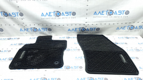 A set of black rubber floor mats for a 7-seater VW Tiguan 20-24.