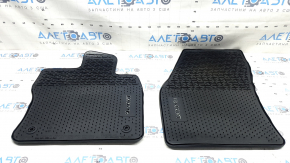 A set of black rubber floor mats for a 7-seater VW Tiguan 20-24.